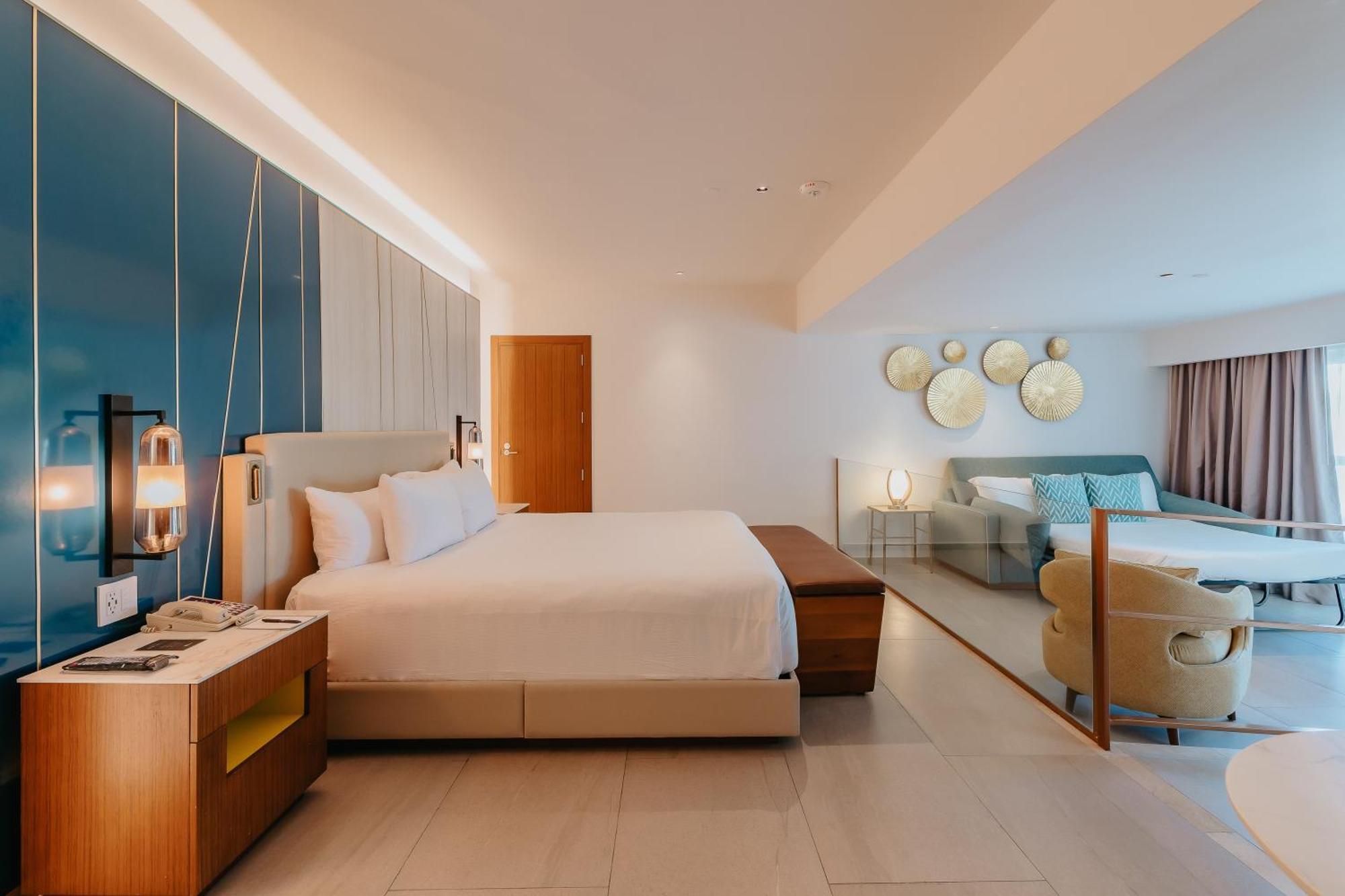 Suíte Caribenha com Cama King-size e Sofá-cama - Acessível a Pessoas com Mobilidade Condicionada